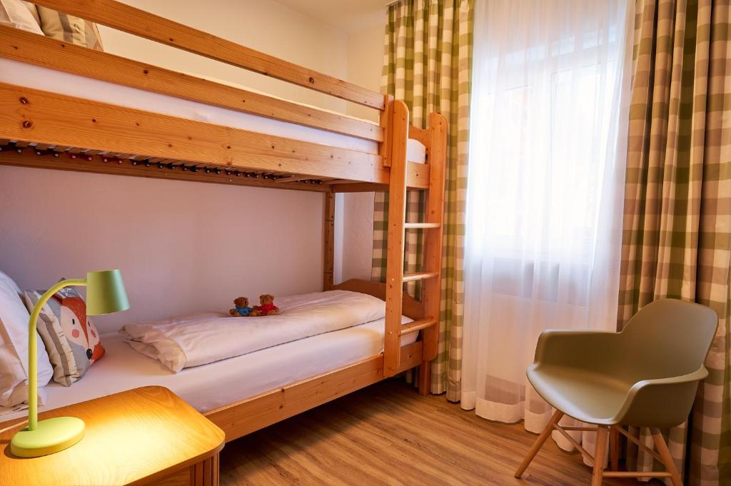Postel nebo postele na pokoji v ubytování Oberstdorfer Ferienwelt