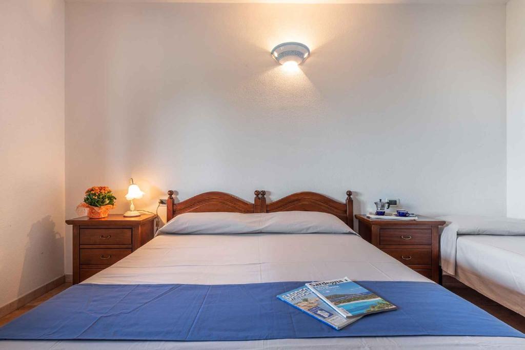 A bed or beds in a room at House and Apts. Siniscola/Sardinien 35758