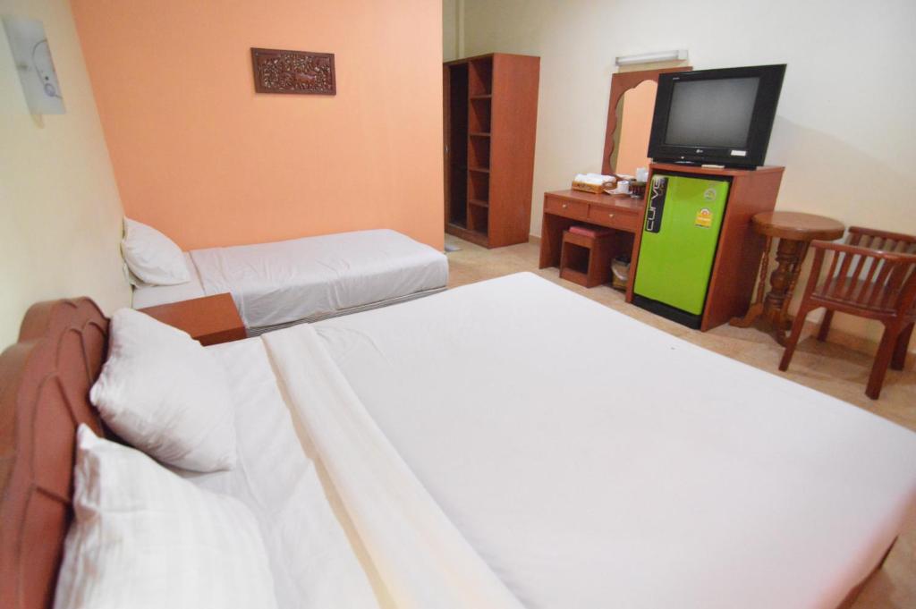 Postel nebo postele na pokoji v ubytování Techno Riverview Resort