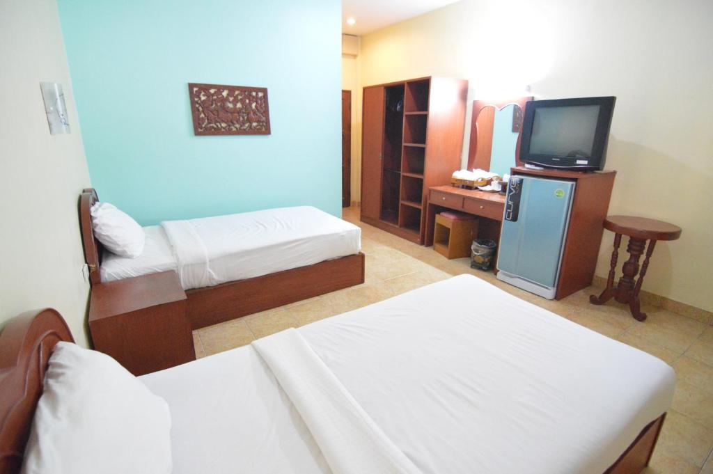 Postel nebo postele na pokoji v ubytování Techno Riverview Resort