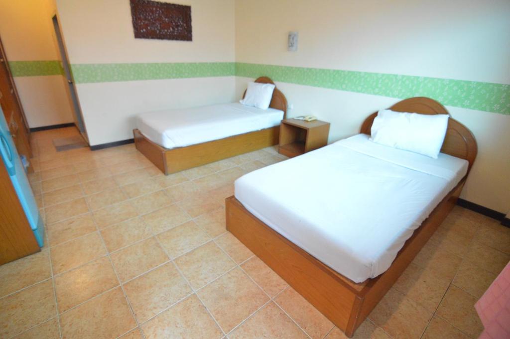 Postel nebo postele na pokoji v ubytování Techno Riverview Resort