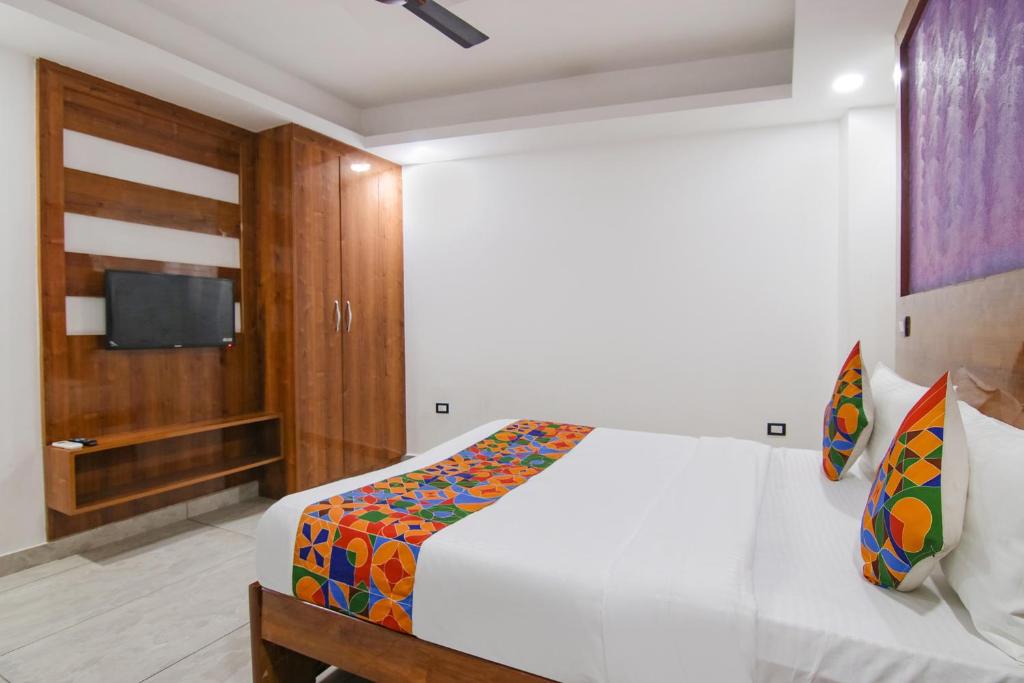 Postel nebo postele na pokoji v ubytování FabHotel The Grand Heritage