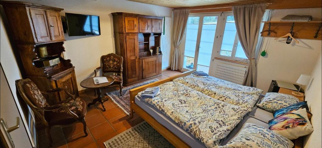 Postel nebo postele na pokoji v ubytování Miramont Horse Trekking Hostel