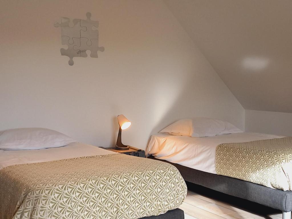 Voodi või voodid majutusasutuse Gîte Maison Faure toas