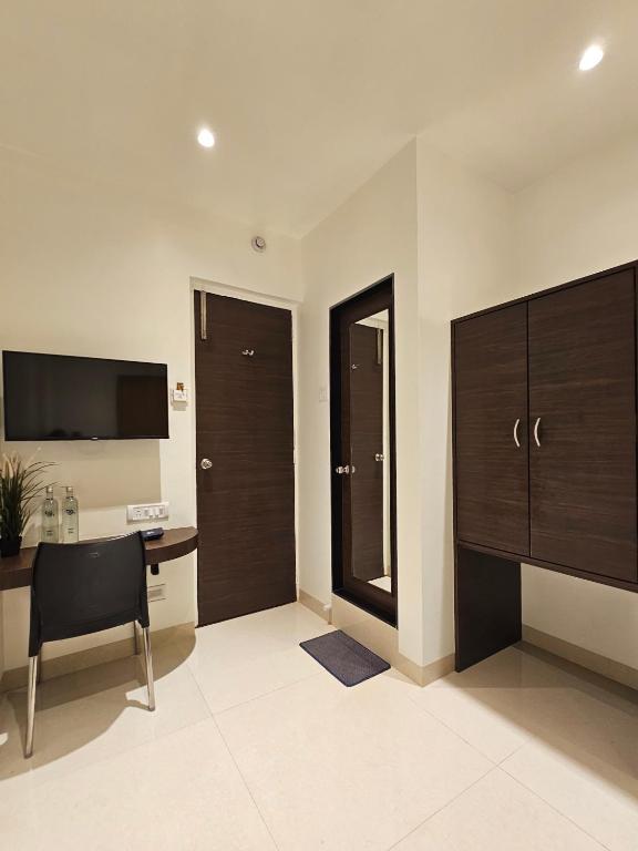 Kuchyň nebo kuchyňský kout v ubytování Hotel Kumkum