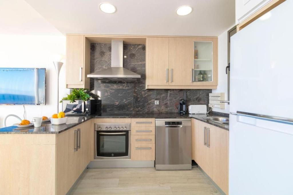 Kuchyň nebo kuchyňský kout v ubytování Respira Mediterraneo 100 Mandala apARTments