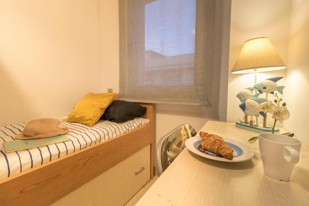 Postel nebo postele na pokoji v ubytování Respira Mediterraneo 100 Mandala apARTments