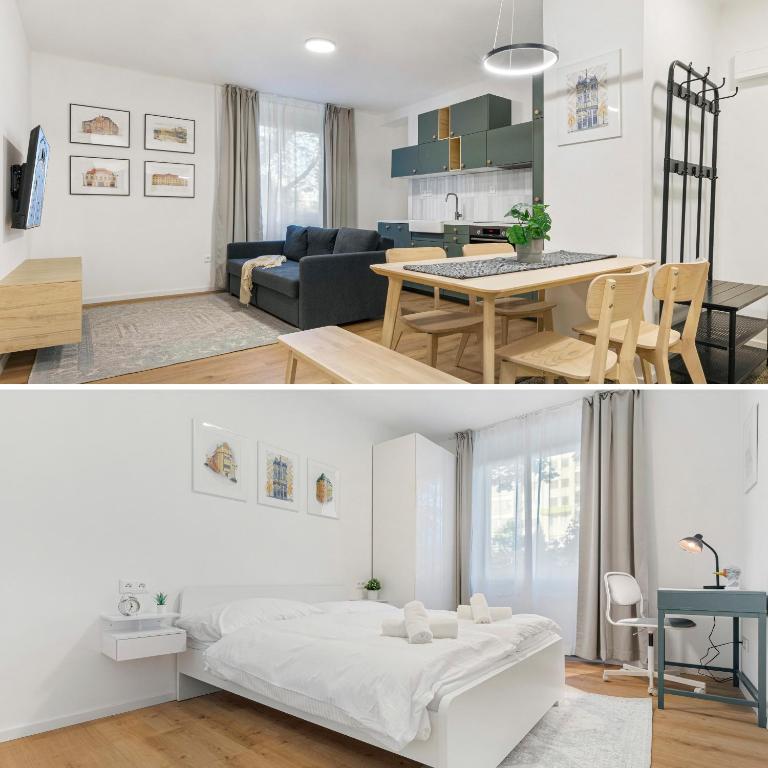 a living room and kitchen with a bed and a table at Bratislava Touch 2 BR Apt in Bratislava