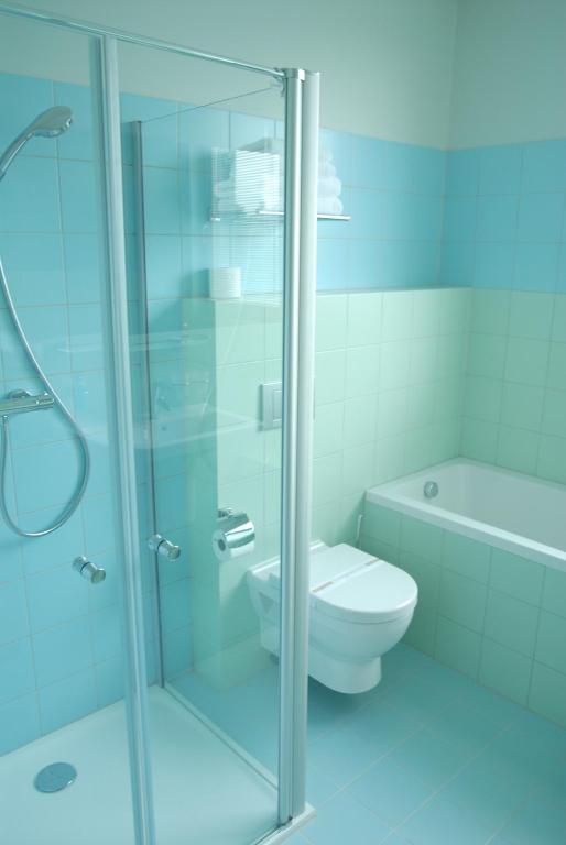 Koupelna v ubytování Hotel Abácie & Wellness