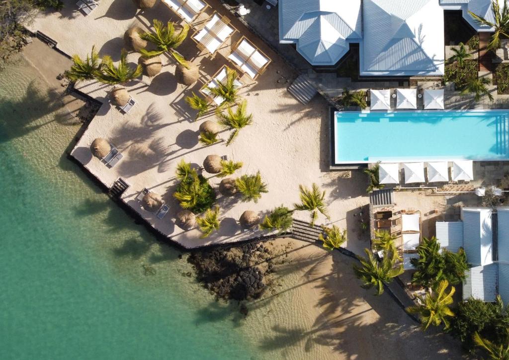 an aerial view of a resort with a swimming pool at Veranda Grand Baie Hotel & Spa in Grand Baie