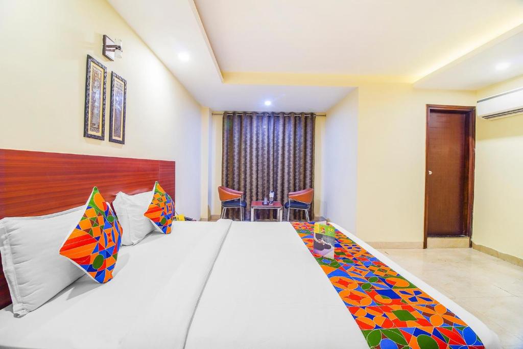 Postel nebo postele na pokoji v ubytování FabHotel VR Stay