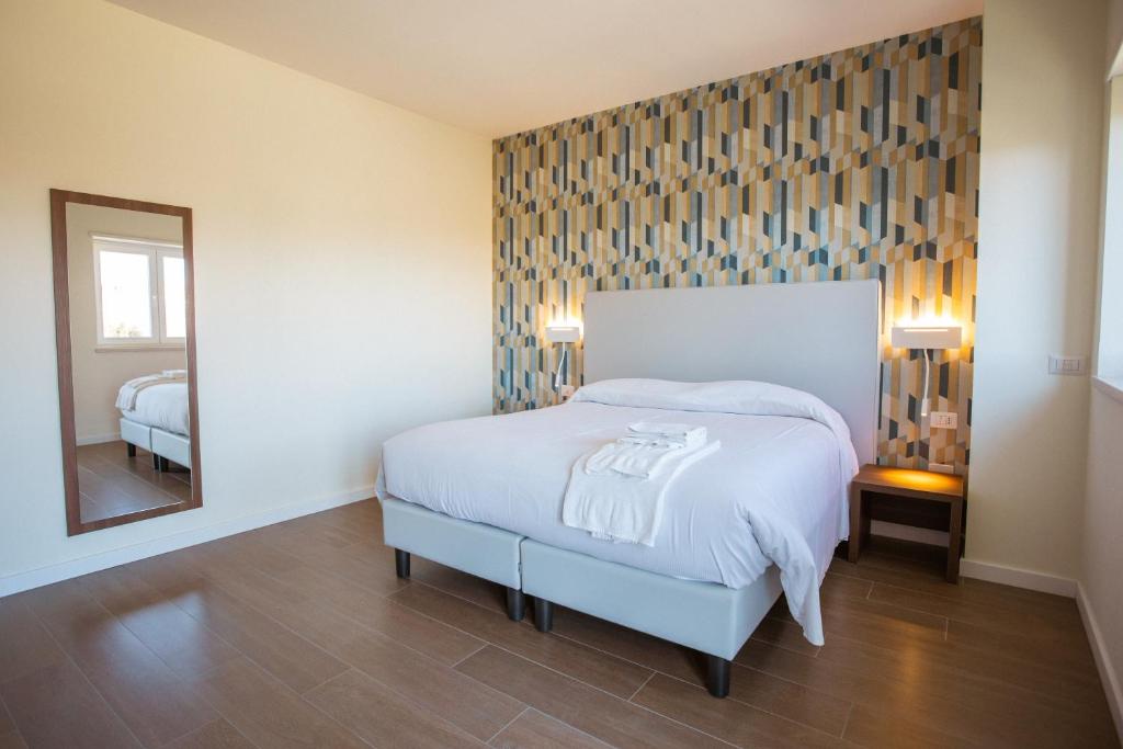 Postel nebo postele na pokoji v ubytování Tre cancelli rooms