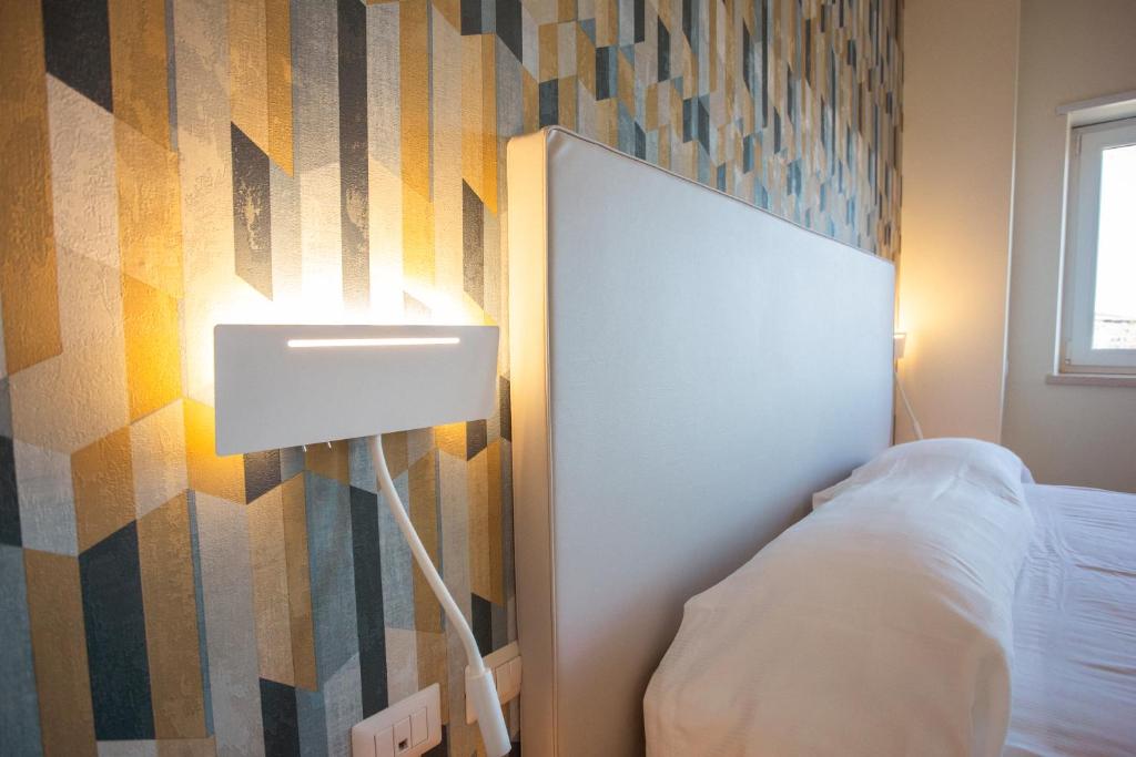 Postel nebo postele na pokoji v ubytování Tre cancelli rooms