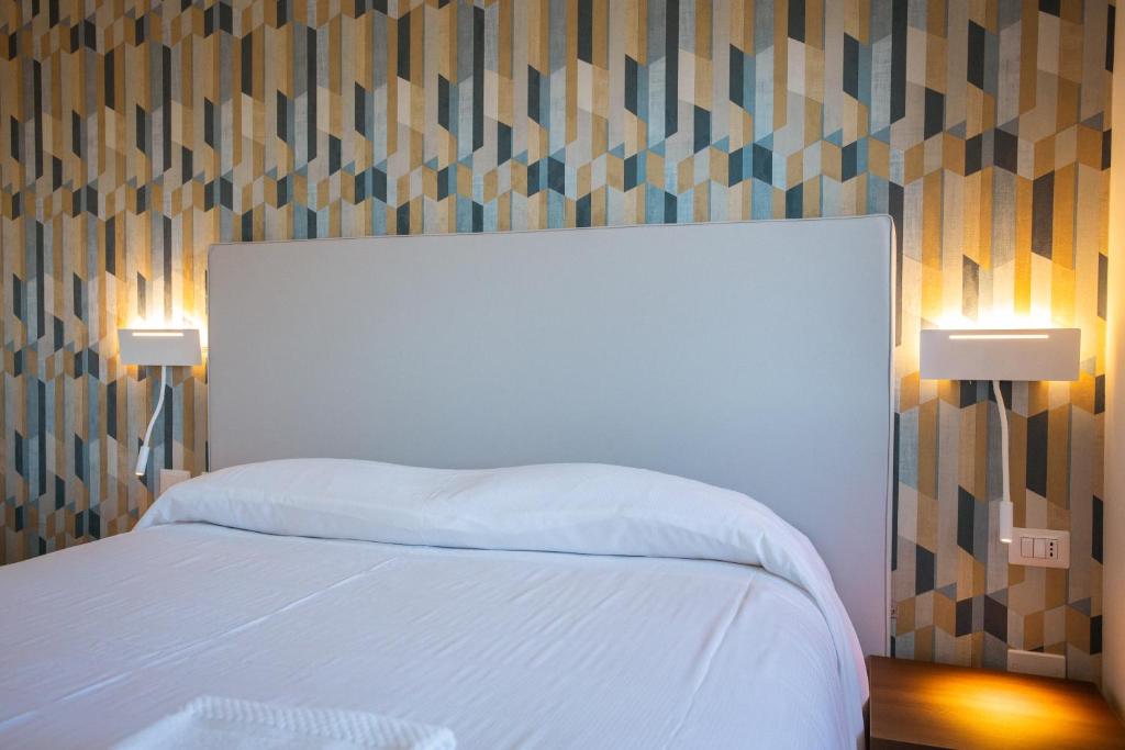 Postel nebo postele na pokoji v ubytování Tre cancelli rooms
