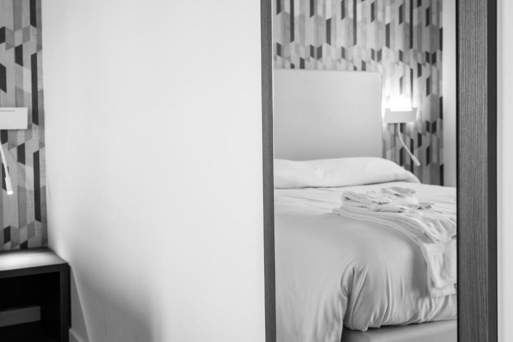 Postel nebo postele na pokoji v ubytování Tre cancelli rooms