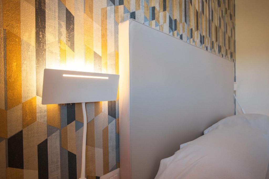 Postel nebo postele na pokoji v ubytování Tre cancelli rooms