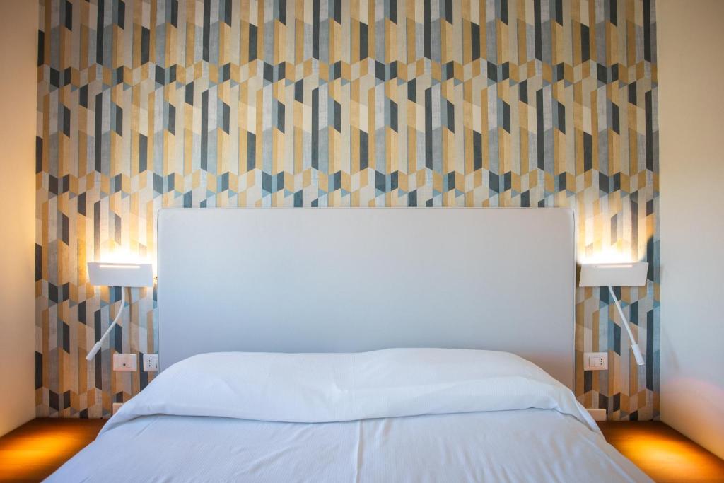 Postel nebo postele na pokoji v ubytování Tre cancelli rooms