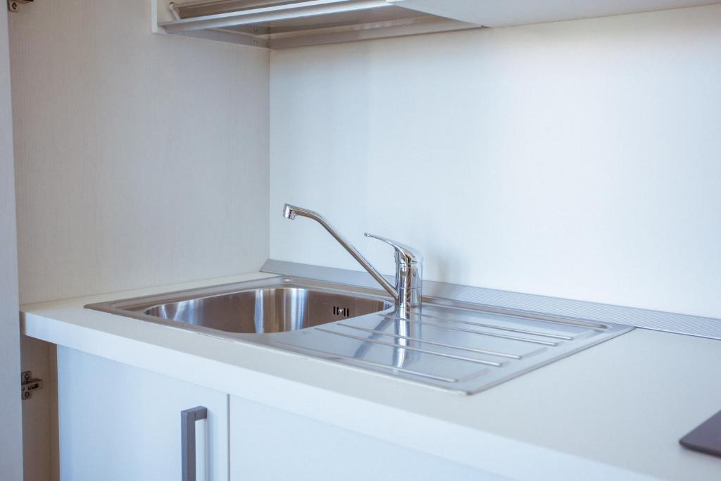 Kuchyň nebo kuchyňský kout v ubytování Tre cancelli rooms