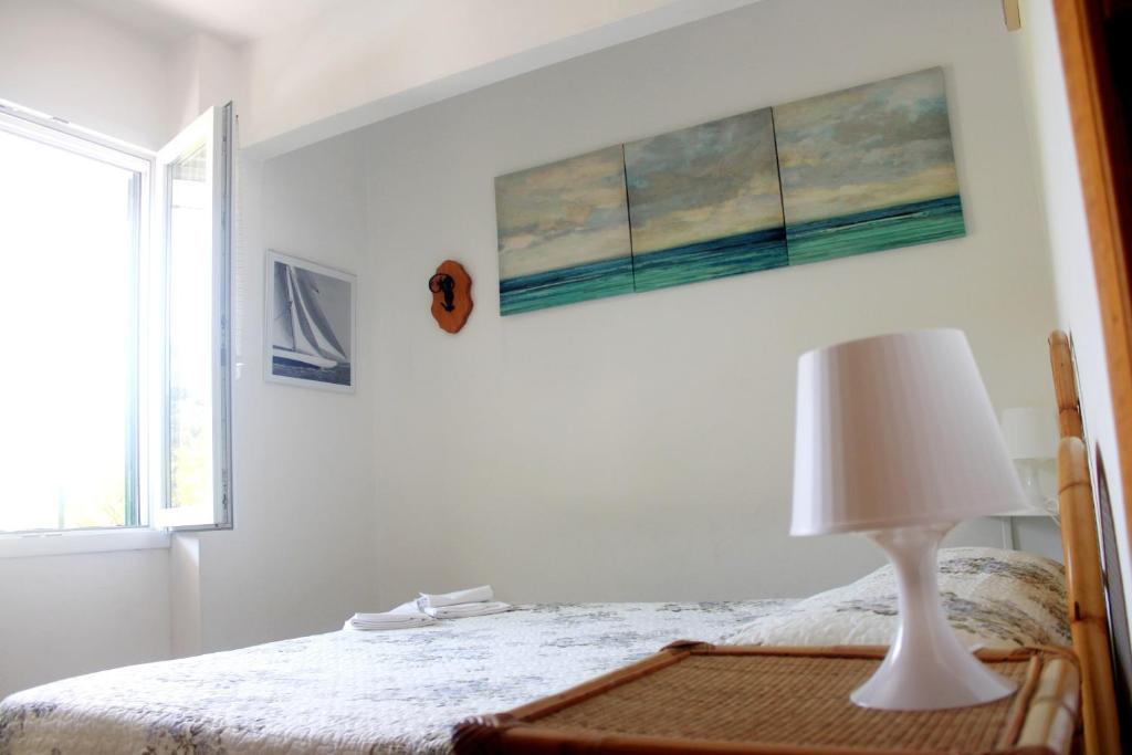 A bed or beds in a room at Primario
