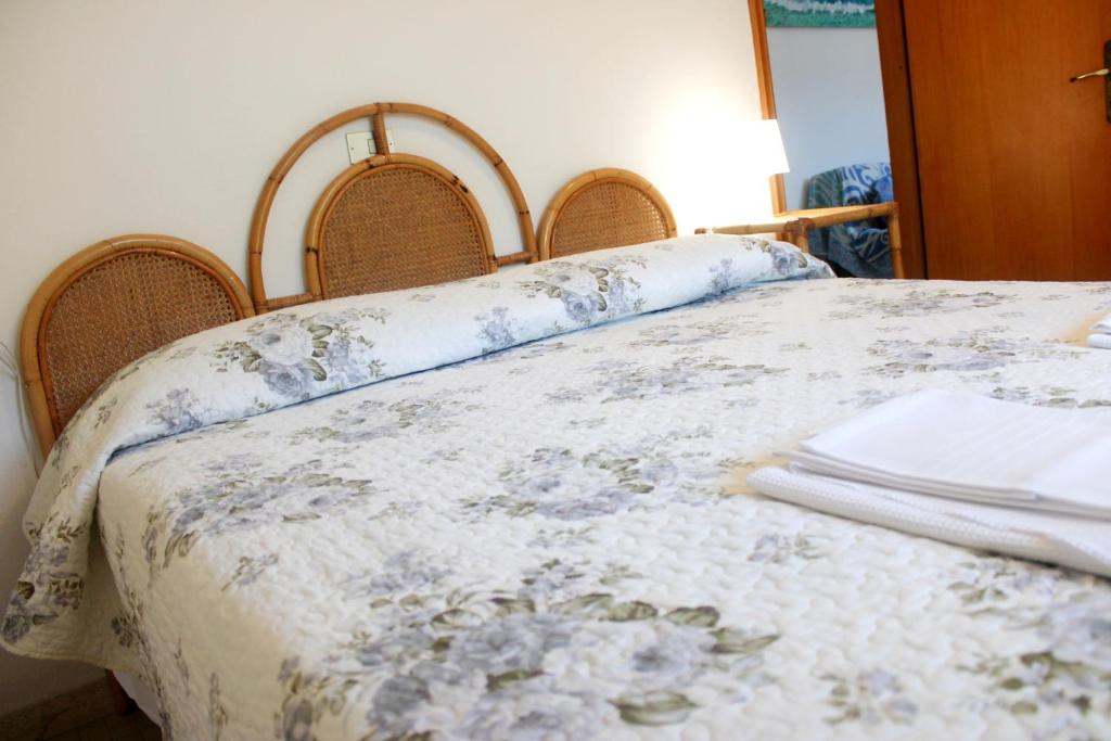A bed or beds in a room at Primario