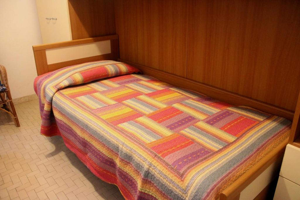 A bed or beds in a room at Primario