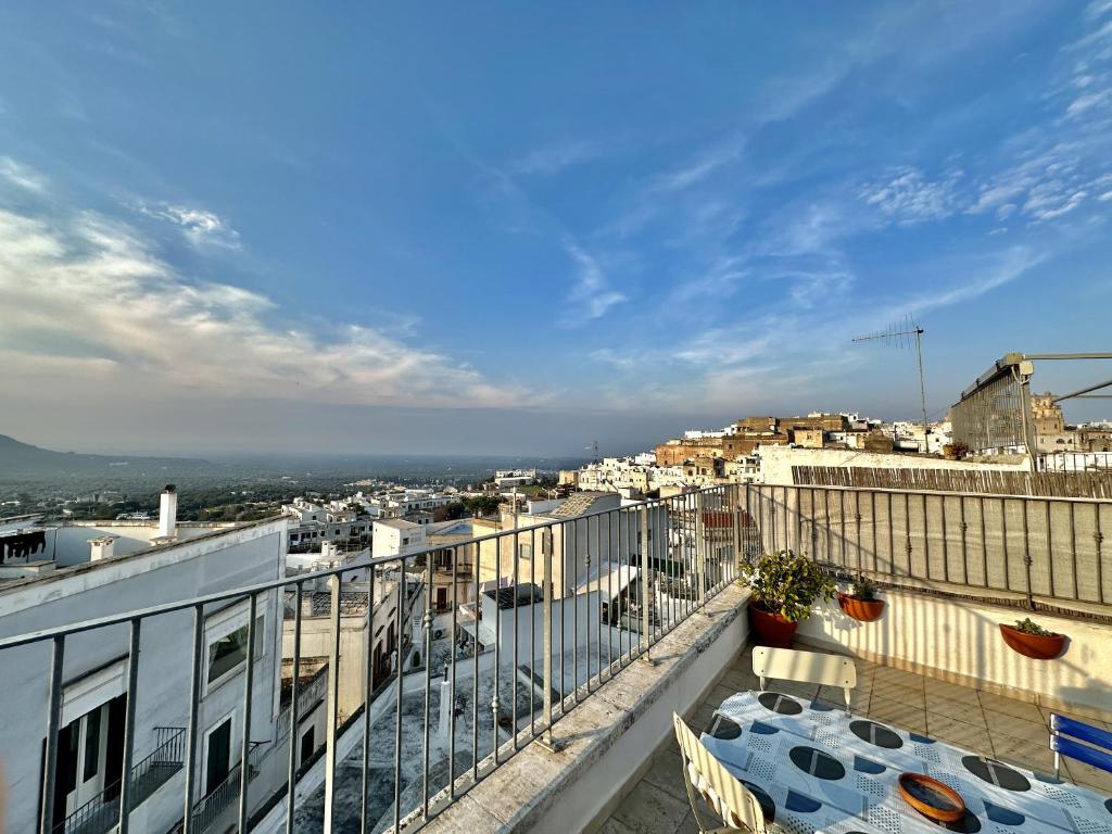 a view of a city from an apartment balcony at Casetta Giorgia in Ostuni