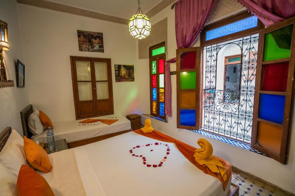 Postel nebo postele na pokoji v ubytování Riad Dar Rabha
