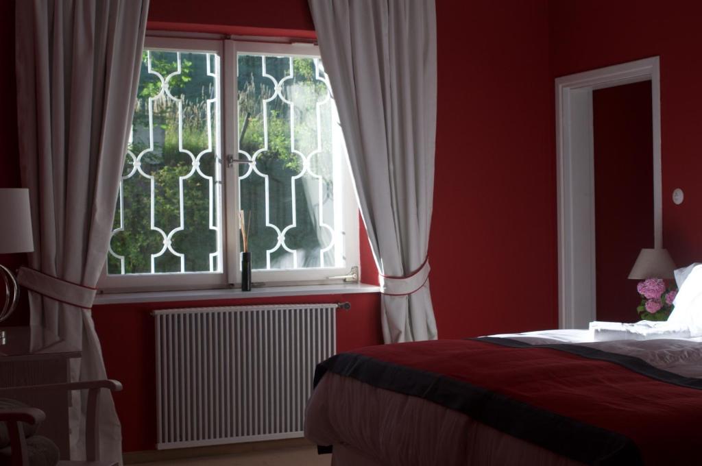 Postel nebo postele na pokoji v ubytování Villa Weiss