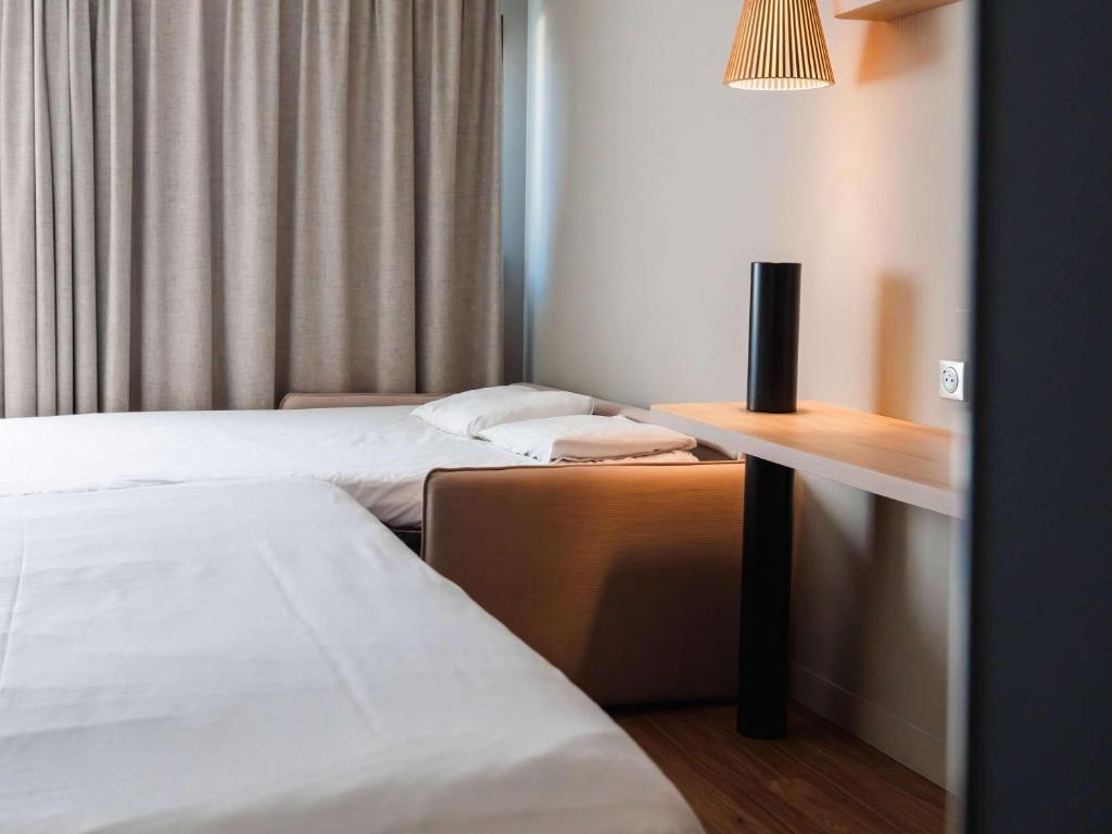 Postel nebo postele na pokoji v ubytování ibis Valence Sud