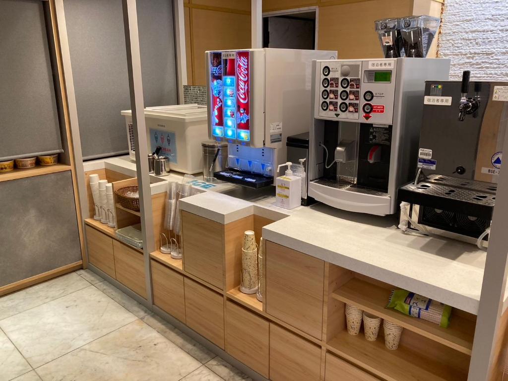 Kuchyň nebo kuchyňský kout v ubytování Dotonbori Hotel