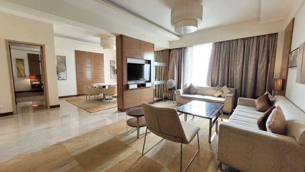 Posezení v ubytování Radisson Blu Hotel, Greater Noida