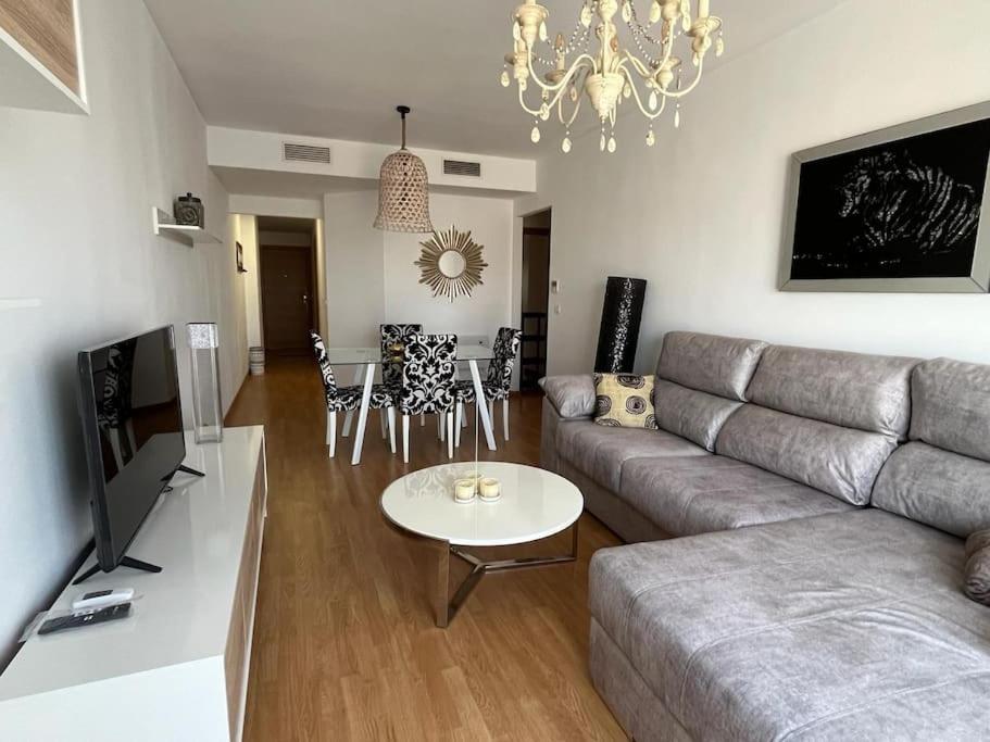 a living room with a couch and a table at Cardenas Home Azabache in Santa Fe