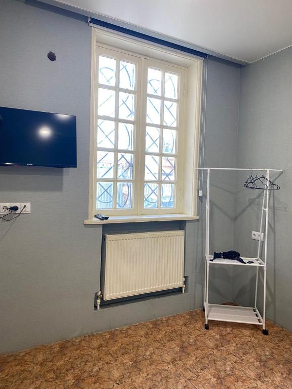 TV a/nebo společenská místnost v ubytování Boutique hotel RaqWine