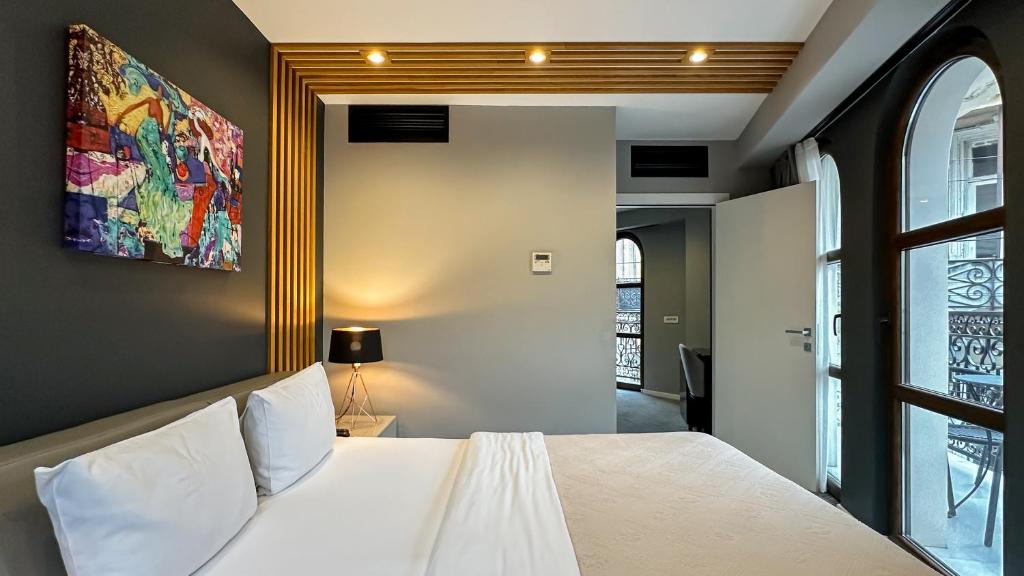 Postel nebo postele na pokoji v ubytování Silver 39 Corner Hotel