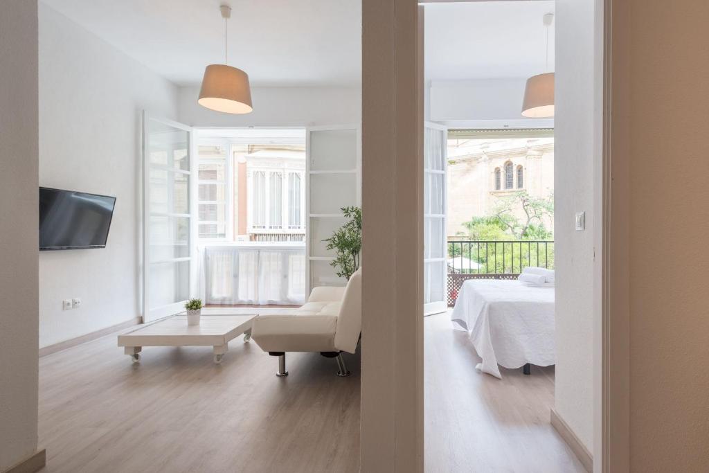 Posteľ alebo postele v izbe v ubytovaní Cathedral Suites