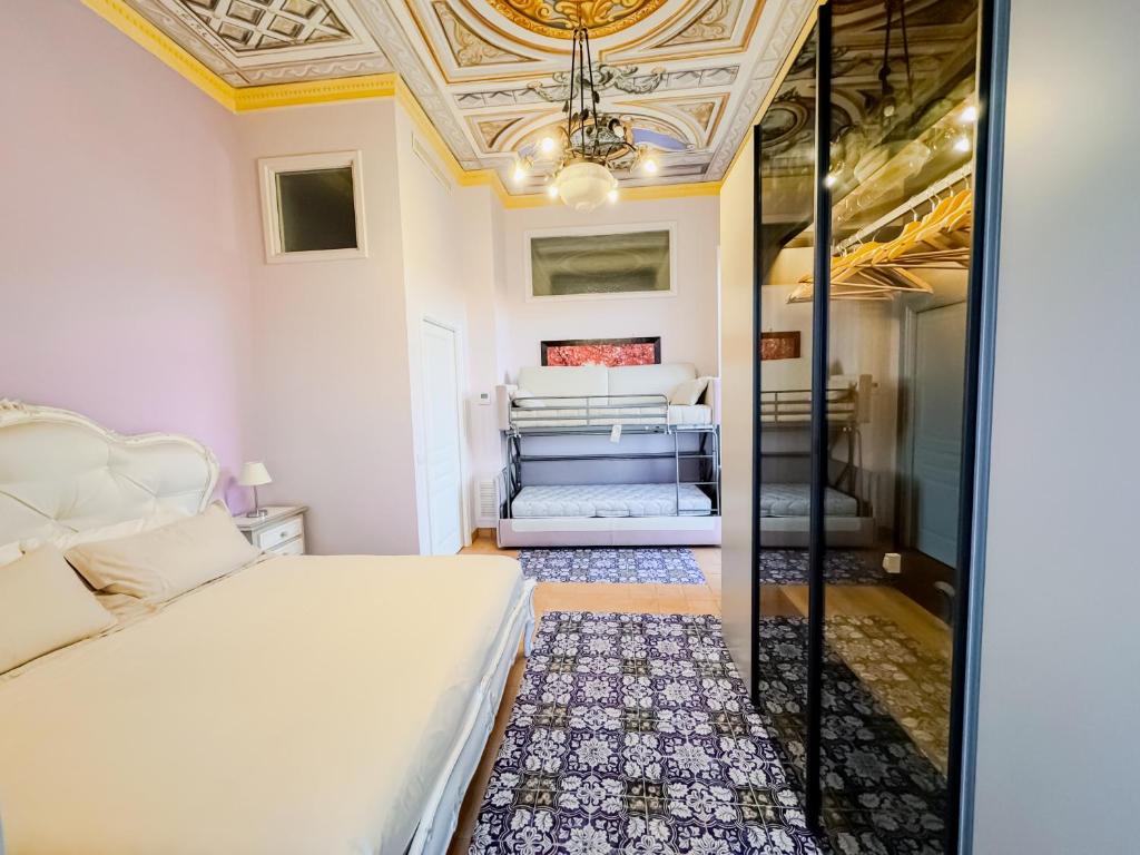 Postel nebo postele na pokoji v ubytování Vanvitelli Palace B&b