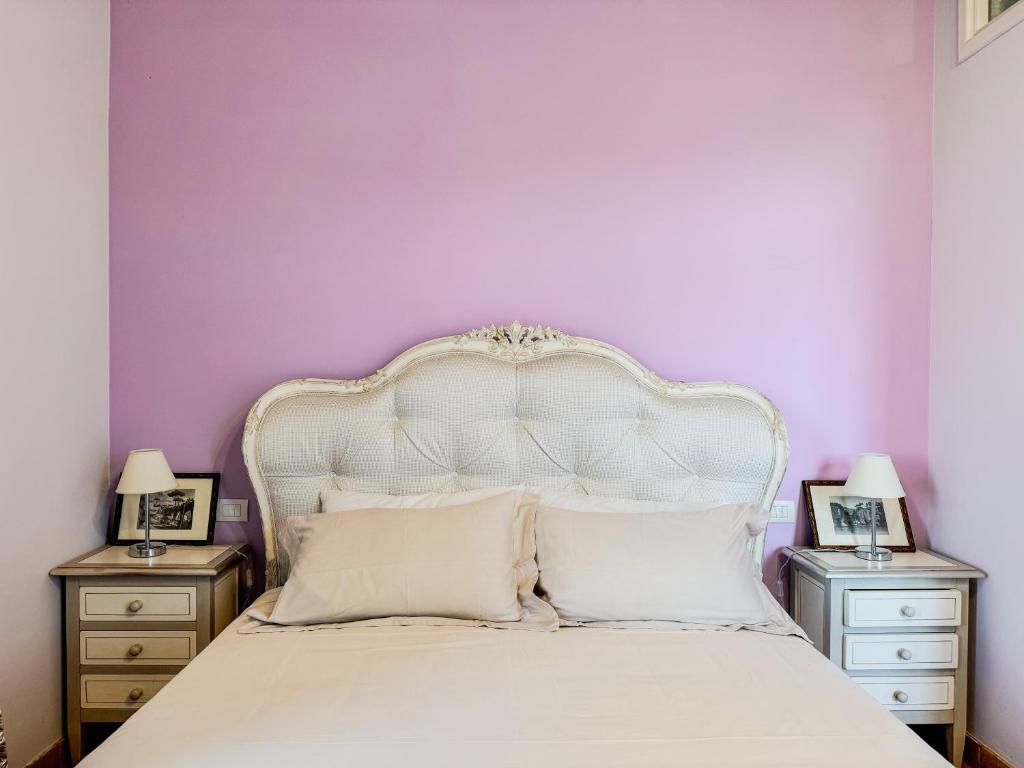 Postel nebo postele na pokoji v ubytování Vanvitelli Palace B&b