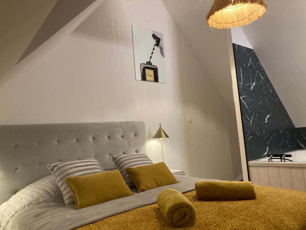Posteľ alebo postele v izbe v ubytovaní Gîte ELIROSE