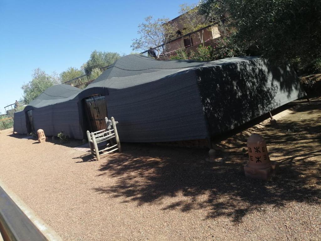 a large building with a tarp on top of it at Terres d'Amanar in Tahannout