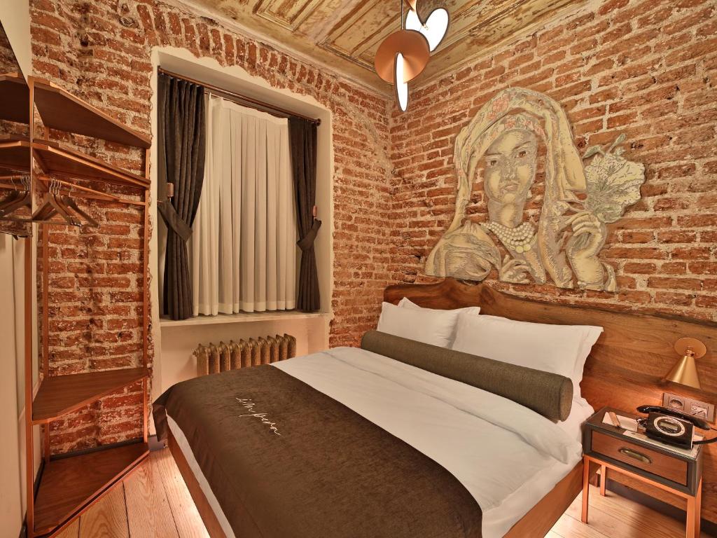 Postel nebo postele na pokoji v ubytování Impera Hotel - Special Category