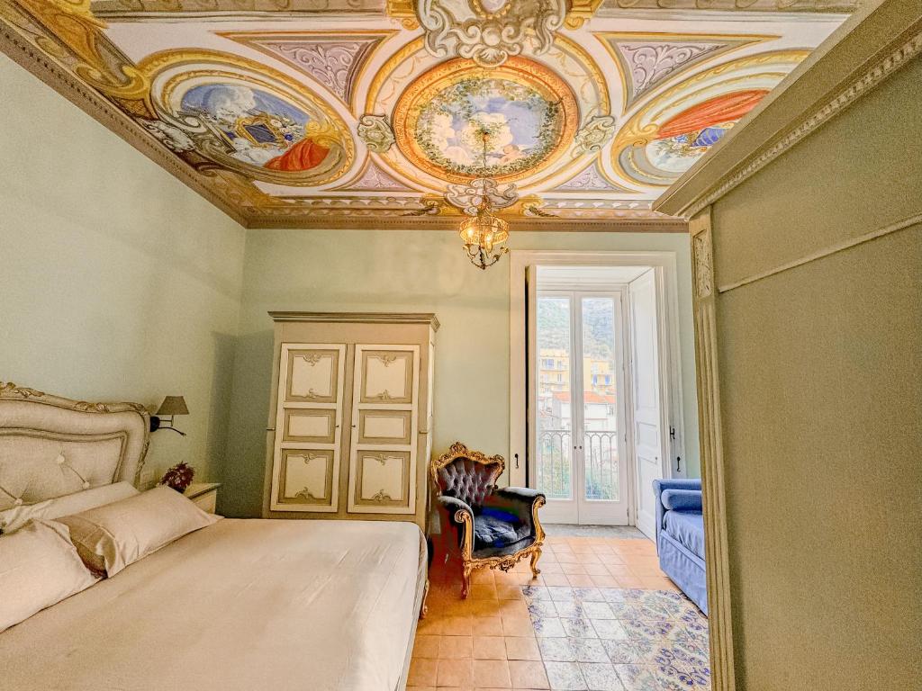 Postel nebo postele na pokoji v ubytování Vanvitelli Palace B&b