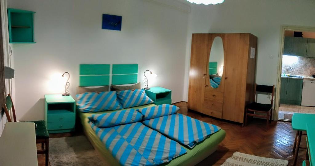 Posteľ alebo postele v izbe v ubytovaní Füsti fecske apartman