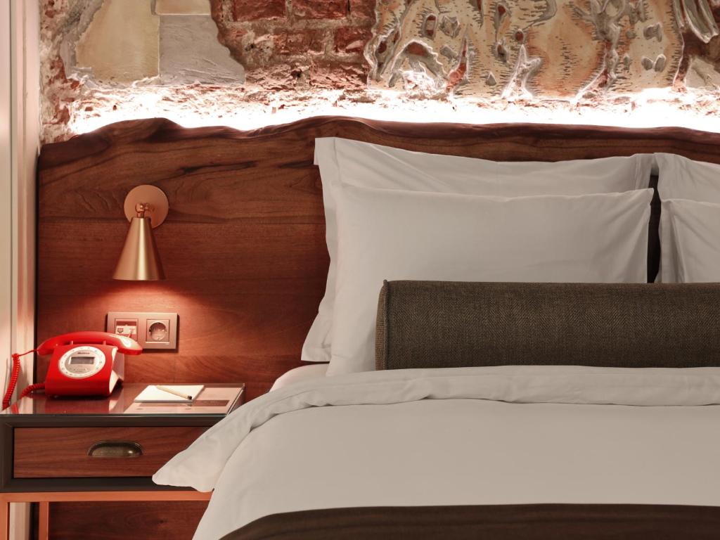 Postel nebo postele na pokoji v ubytování Impera Hotel - Special Category