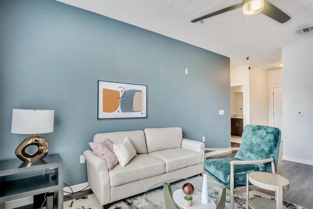 a living room with a couch and chairs at Landing Modern Apartment with Amazing Amenities (ID5692X84) in Tampa