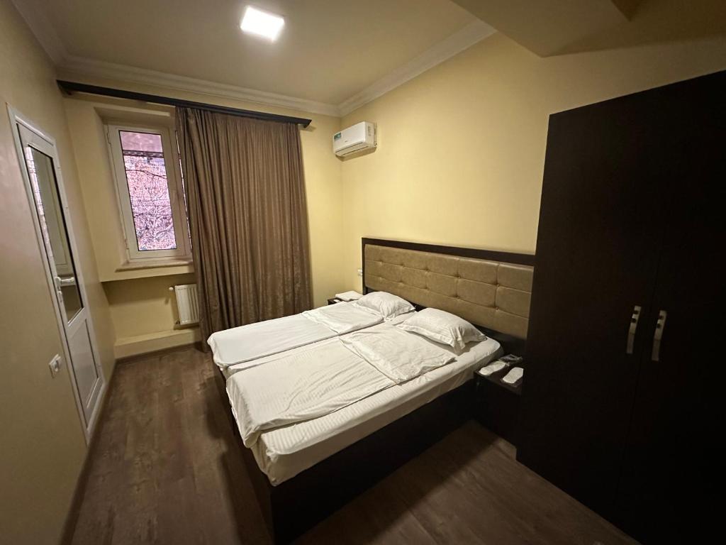 Postel nebo postele na pokoji v ubytování Express Hotel