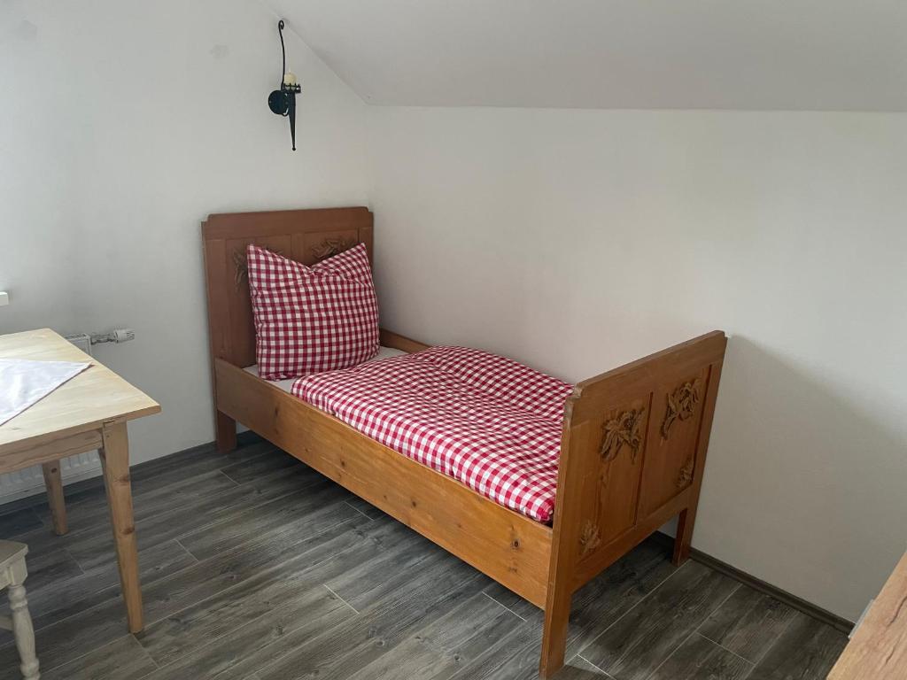 Postel nebo postele na pokoji v ubytování Haus Olympia