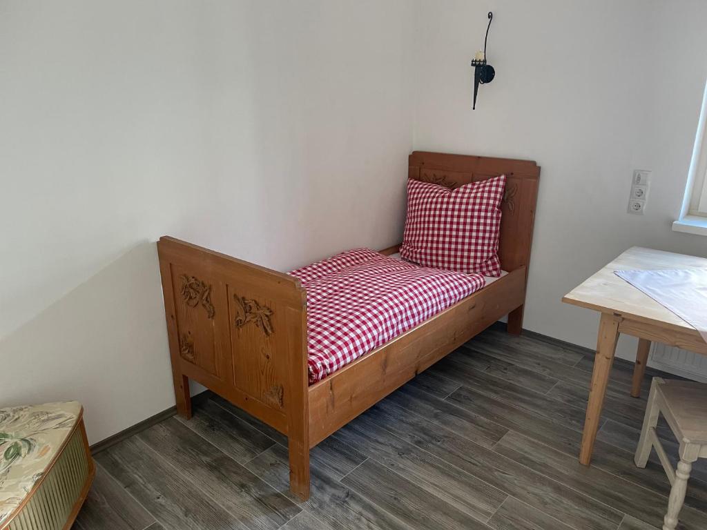 Postel nebo postele na pokoji v ubytování Haus Olympia