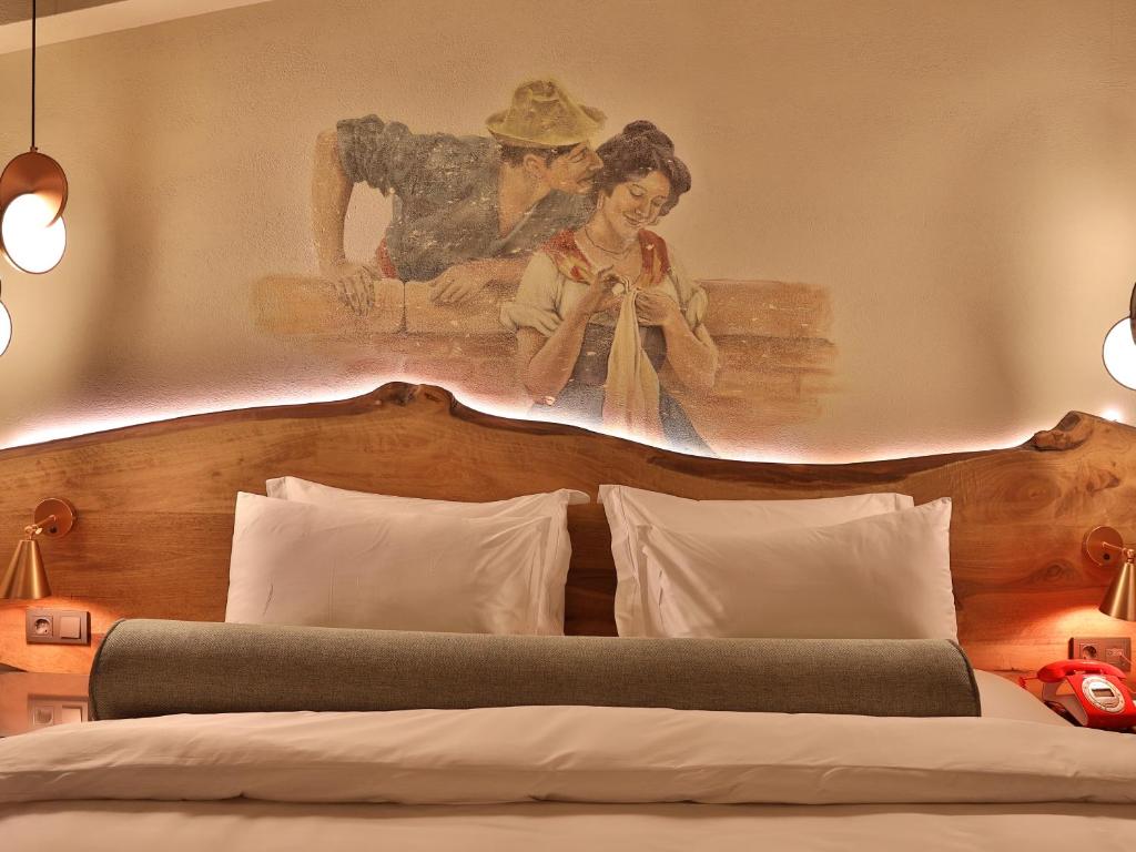 Postel nebo postele na pokoji v ubytování Impera Hotel - Special Category