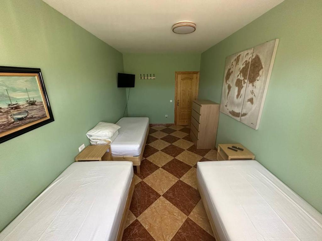 Postel nebo postele na pokoji v ubytování Moto Vila Groot