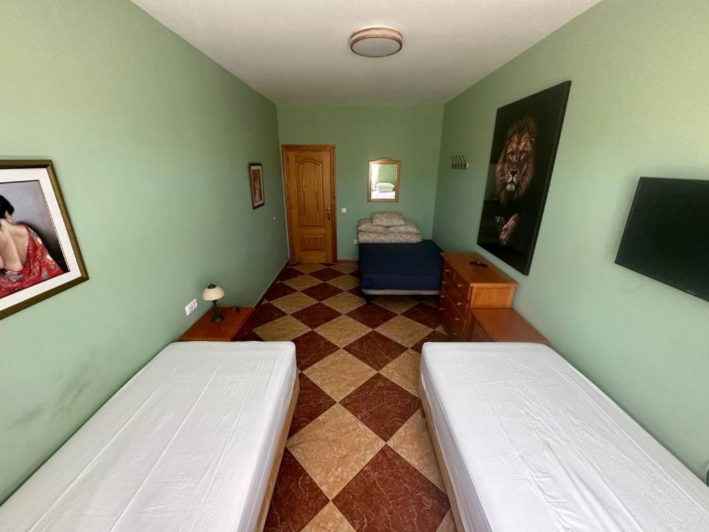 Postel nebo postele na pokoji v ubytování Moto Vila Groot
